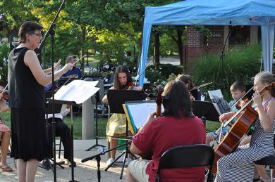 The Homewood Flossmoor Suzuki Summer Strings Orchestra performs Aug. 18 during the first portion of the inaugural Chamber Night in downtown Flossmoor. (BJ)