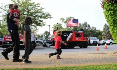 CN Railway's Lil' Obie gives rides during National Night Out in Homewood.