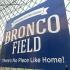 A sign welcomes players and spectators alike to Bronco Field for the championship game. (BJ)