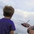 Cole, left, and Ethan Westerhoff of Homewood watch the UCAN helicopter come in for a landing.
