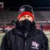 Coach Craig Buzea is masked up for the first game of his last season at the helm of the Vikings. (ABS)