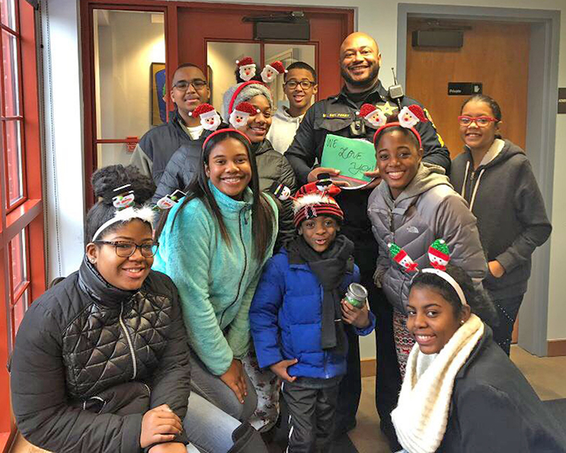 Members of You Matter 2 deliver cookies to Glenwood police, one of the organization's community service projects. (Provided photo)