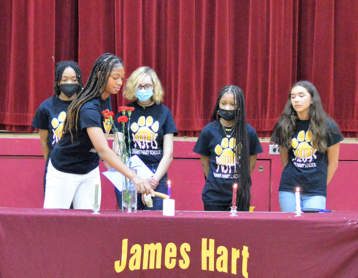 James Hart School students participate in the induction ceremony for new members into the National Junior Honor Society. Cassidy Cage is lighting the candle joined by other NJHS members (back, from left) Jahnahn Webster, Lucia Magan, Kayden Bracey and Lilliana Trinidad. (Provided photo)