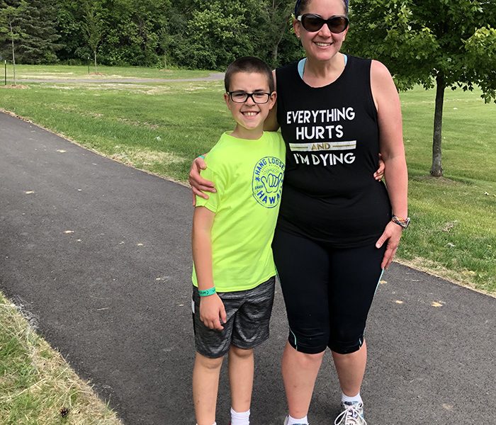 "The Beast" obstacle course proved to be a challenge for Connor Quirke, who ran in the kids race, and his mom, Emily, who took part in the adult race of the H-F Racquet & Fitness Club event. (Marilyn Thomas/H-F Chronicle)
