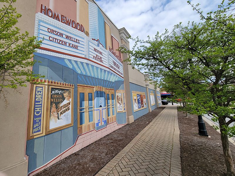 The Haas mural on the south side of Melody Mart is one of 15 in Homewood's collection. The Flossmoor Veterans Memorial group is sponsoring a walking tour of Haas murals on July 31. (Eric Crump/H-F Chronicle)