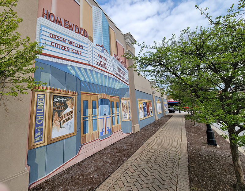 The Haas mural on the south side of Melody Mart is one of 15 in Homewood's collection. The Flossmoor Veterans Memorial group is sponsoring a walking tour of Haas murals on July 31. (Eric Crump/H-F Chronicle)