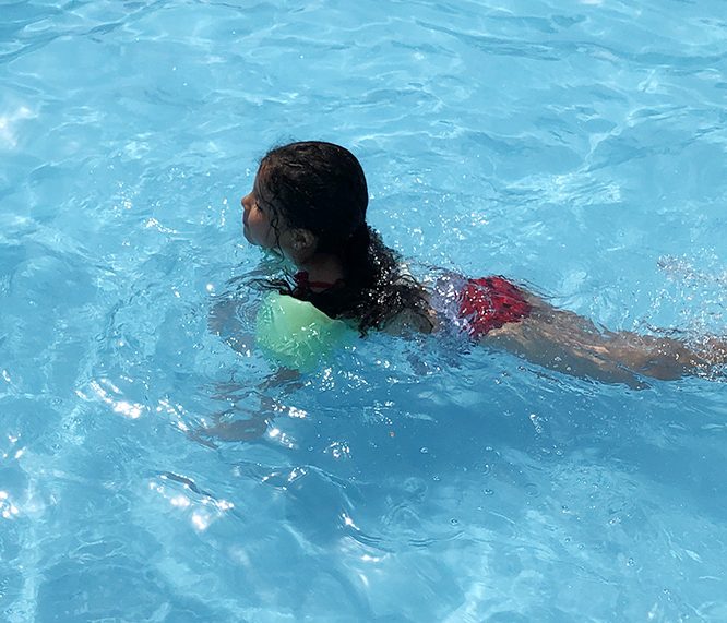 Maiya Morales, 4, of Homewood, enjoyed the water in the little kids pool at Lions Club Pool on Wednesday. (Marilyn Thomas/H-F Chronicle)