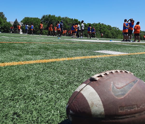 Campers were given T-shirts and lunch at former NFL player Keith Rucker's Rise 4 the Sky camp at H-F Saturday. (David P. Funk/H-F Chronicle)