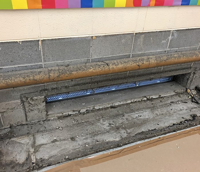 Dust and dirt is visible where an old heating unit was pulled out at Churchill School. Federal government funds are helping cover the costs for updated units. (Marilyn Thomas/H-F Chronicle)