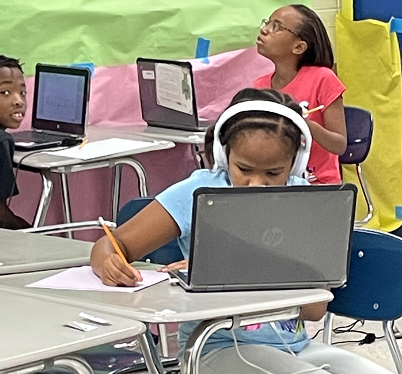 Flossmoor School District 161 Summer Academy students try to concentrate on their work. (Carole Sharwarko/H-F Chronicle)