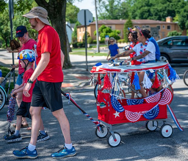 july4parade_220704_4 Justin Tanner pulls his daughter, June Tanner, in a decorated wagon during the Flossmoor 4th of July parade. (ABS)
