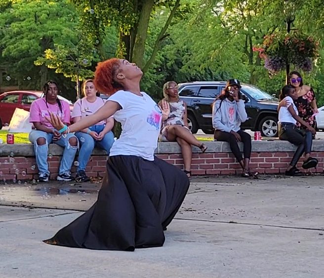 Iyeisha Ellis performs a dance in honor of her cousin, Alexis Wilson. (Eric Crump/H-F Chronicle)