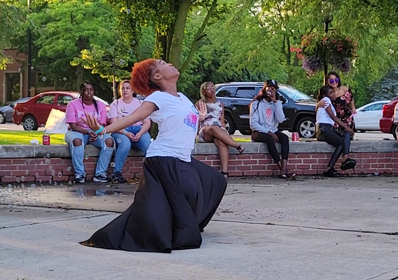 Iyeisha Ellis performs a dance in honor of her cousin, Alexis Wilson. (Eric Crump/H-F Chronicle)