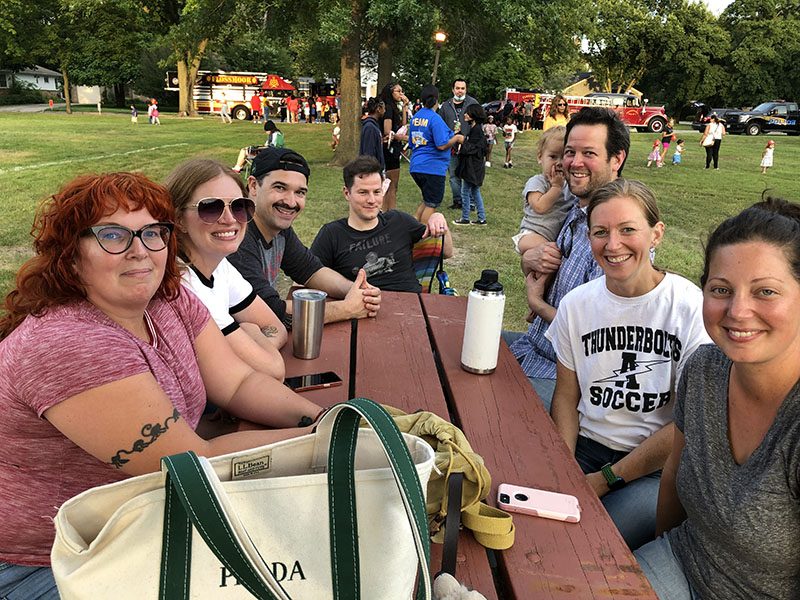 Parents gathered for their own fun time are, from left, Sheri Pieroy, Amie Day, Zach Day, Steve Pieroy, Zach Swartz with daughter Lillian, Katie Sikkema and Megan Swartz. (Marilyn Thomas/H-F Chronicle)