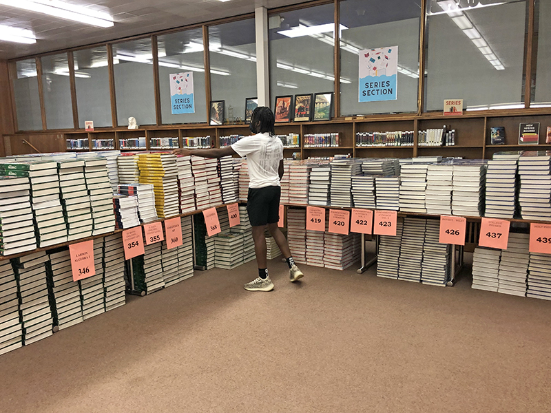 Stacks of books were ready for pick-up during the three-day registration period at H-F High. (H-F Chronicle)
