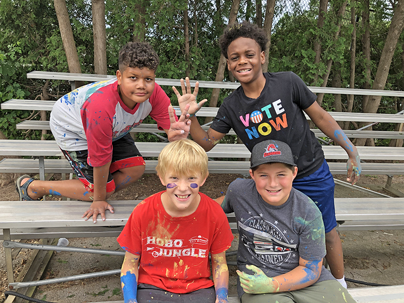 Hobo Jungle campers were, seated, Tyler Matula at left, and Owen Linde with top Jack Schott, left, and Myles Naylor. (Marilyn Thomas/H-F Chronicle)
