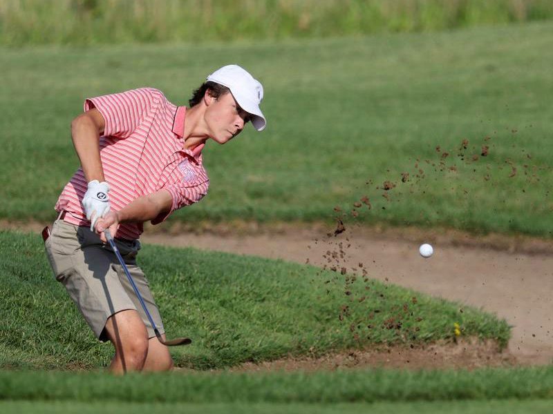 Jack Keigher chips from a sand trap. The H-F junior will lead the golf team this year. (Provided photo)