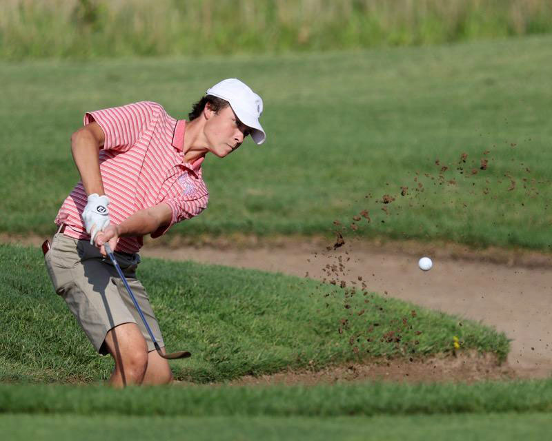 Jack Keigher chips from a sand trap. The H-F junior will lead the golf team this year. (Provided photo)