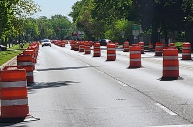 Barrels are used in May to test the effect of reducing 183rd Street from four lanes to two. The village is seeking a grant that would help with the costs of making that change permanent. (Chronicle file photo)