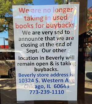 A sign on the window at Bookie's New and Used Books in Homewood announces the pending closure of the store. (Eric Crump/H-F Chronicle)