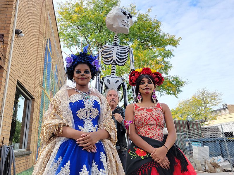 Two La Catrinas and a skeleton were at Fall Fest to promote Homewood's Dia de los Muertos festival on Oct. 15. (Eric Crump/H-F Chronicle)