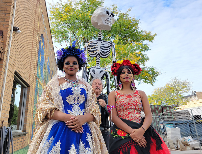 Two La Catrinas and a skeleton were at Fall Fest to promote Homewood's Dia de los Muertos festival on Oct. 15. (Eric Crump/H-F Chronicle)