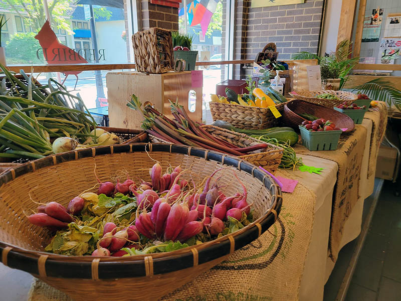 The Redbird Cafe market has a table just inside the door where a changing variety of fresh produce is displayed. (Eric Crump/H-F Chronicle)