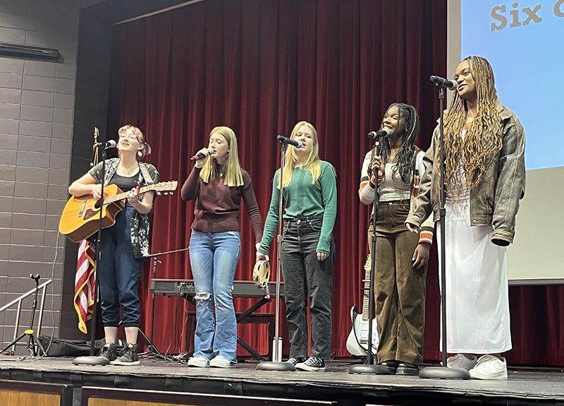 The Six of Spades performs in the Mall Auditorium at H-f High School before the senior citizens breakfast on Oct. 27. (Nick Ulanowski/H-F Chronicle)