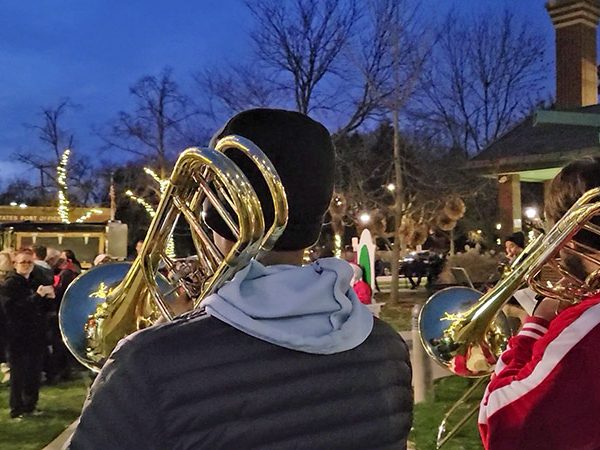 Members of the South Suburban Trombone Choir perform on the south lawn of Flossmoor Public Library. (Eric Crump/H-F Chronicle)
