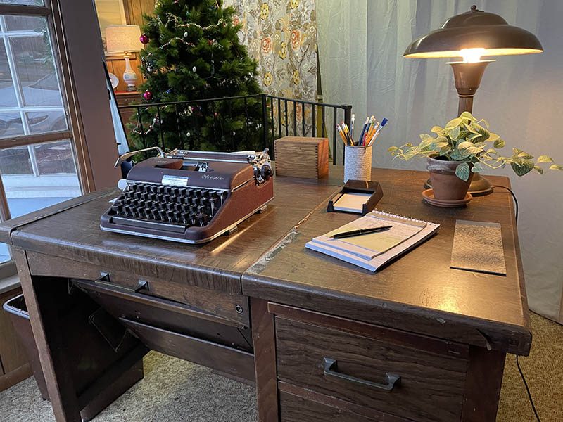 A desk that belonged to the Wagner family helps create a scene in one of the front windows of Flossmoor’s Wagner Building, the planned site of a history and arts space. (Bill Jones/H-F Chronicle)