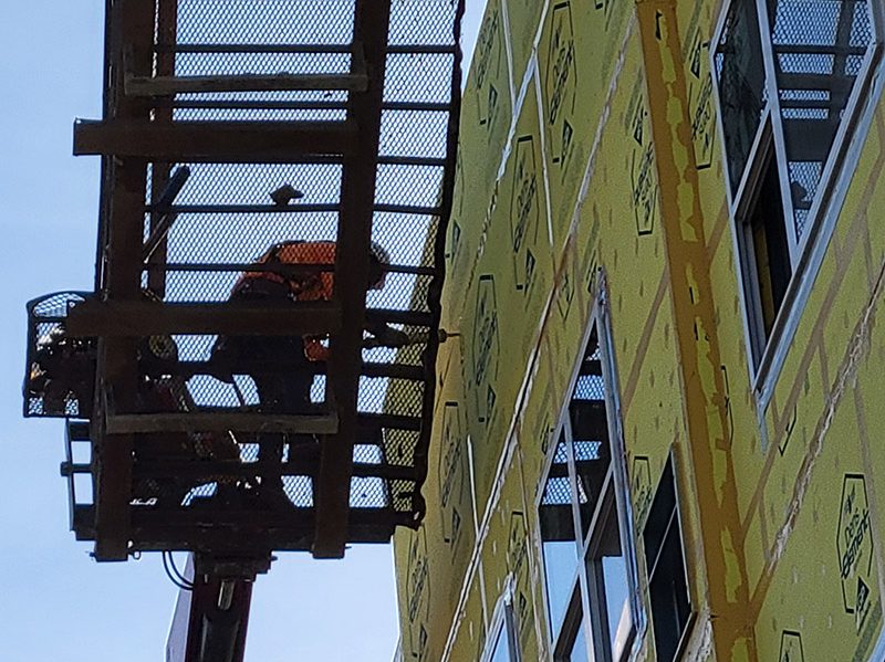 Work continues on the Hartford Building at the intersection of Ridge Road and Martin Avenue in downtown Homewood in this Oct. 24 photo. (Eric Crump/H-F Chronicle)