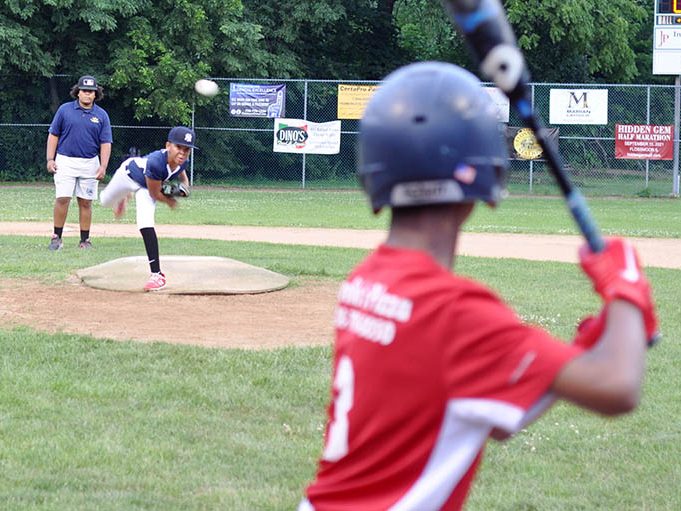 Bryce Gilmore throws a pitch Wednesday, July 14, during Flossmoor Baseball’s Bronco championship game. (Bill Jones/H-F Chronicle)