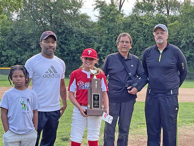 During the presentation of the Jarrett Rowe Memorial Award, (left to right) Ashton and Hopeton Rowe stand alongside winner Brynn Williams, Chuck Michaels and Rick Lukasik. (Bill Jones/H-F Chronicle)