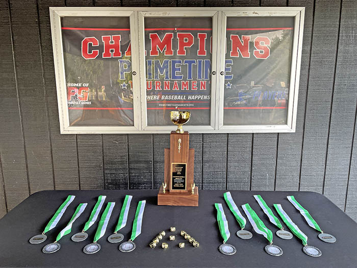 Medals and rings surround the Jarrett Rowe Memorial Award. (Bill Jones/H-F Chronicle)