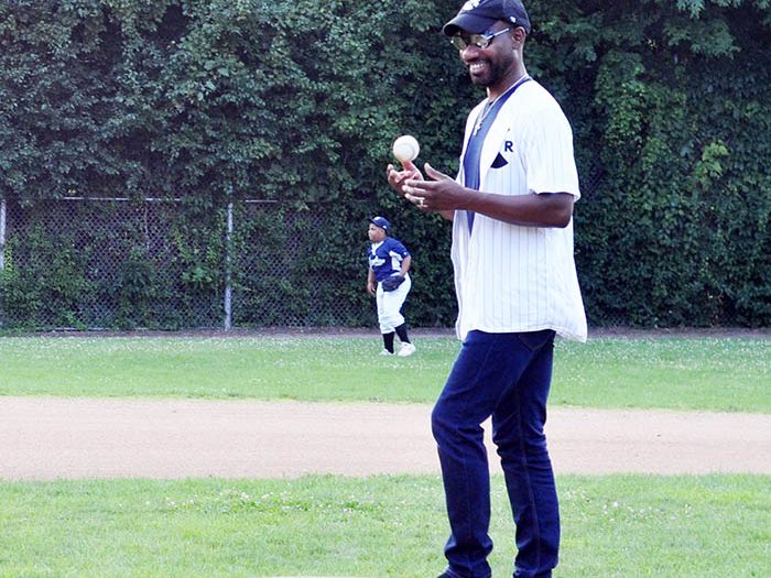 Curtis Jones, also known as Green Velvet, steps up to throw out the first pitch before the start of the Bronco championship between the Yankees and Phillies. (Bill Jones/H-F Chronicle)