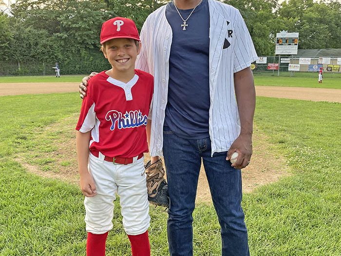 Green Velvet poses for a photo with the Phillies’ Brady Williams, who served as the catcher for the first pitch. (Bill Jones/H-F Chronicle)