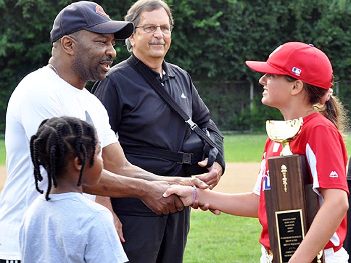 After winning the Jarrett Rowe Memorial Award, Brynn Williams thanks Hopeton Rowe, Jarrett’s father. (Bill Jones/H-F Chronicle)