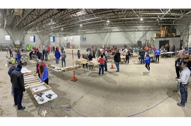 The Flossmoor Public Works garage is buzzing with activity on Saturday, Jan. 11, for a Sleep in Heavenly Peace bed build, among the village’s Martin Luther King Jr. Day of Service activities. (Bill Jones/H-F Chronicle)