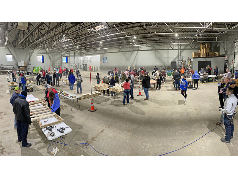 The Flossmoor Public Works garage is buzzing with activity on Saturday, Jan. 11, for a Sleep in Heavenly Peace bed build, among the village’s Martin Luther King Jr. Day of Service activities. (Bill Jones/H-F Chronicle)