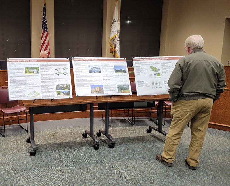 Informational posters are on display during an open house on Oct. 27, 2022, to give residents a chance to look at the nearly completed zoning code revision. The event was one of seven public meetings during the 18-month code revision project. (Eric Crump/H-F Chronicle)