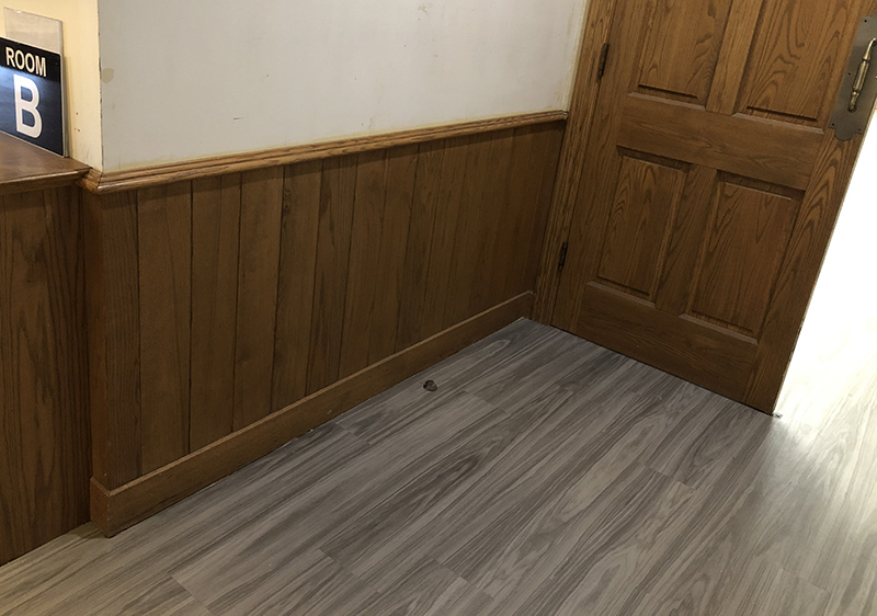 One of the last sections of wood paneling in the lobby area of the Irwin Center will be removed soon. The building is being remodeled and updated. (Marilyn Thomas/H-F Chronicle)
