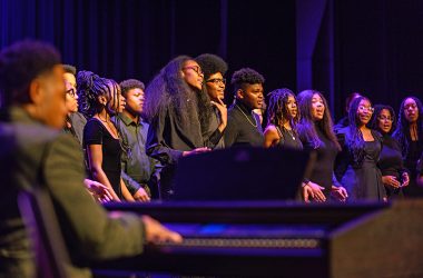 The Inspirational Voices choir performs gospel music to a live backing band. (Andrew Burke-Stevenson/H-F Chronicle)