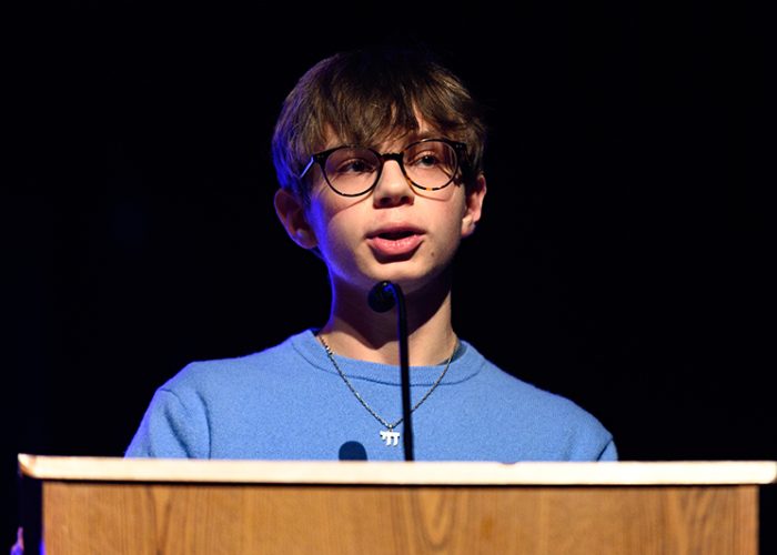 Student Joshua Jury reads his essay “Birthright Complexity” at Pursuing the Dream on Jan. 11. (Andrew Burke-Stevenson/H-F Chronicle)