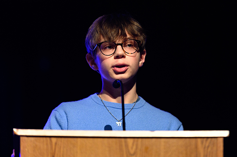 Student Joshua Jury reads his essay “Birthright Complexity” at Pursuing the Dream on Jan. 11. (Andrew Burke-Stevenson/H-F Chronicle)