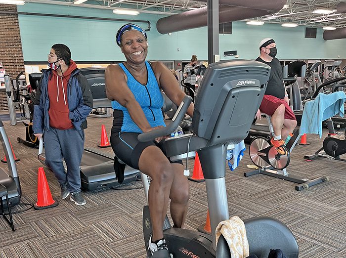 Stephanie Carr competes on the bicycle machine. (Nick Ulanowski/H-F Chronicle)