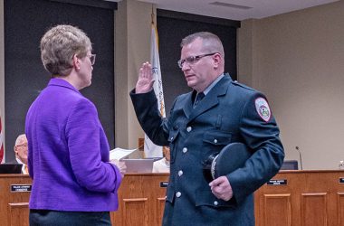 Kenneth Strunk, right, is sworn in Tuesday, Jan. 24, as a Homewood police officer. Strunk is returning to the police department after leaving in 2014. (Ryan Burke-Stevenson/H-F Chronicle)