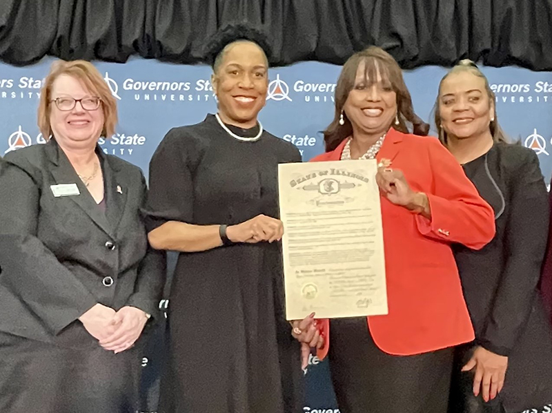 Lt. Gov. Juliana Stratton (second from left) and state Rep. Debbie Meyers-Martin hold the proclamation announcing GSU’s collaboration on the stroke prevention project. GSU Provost Beverly Schneller (left) and Tonya Roberson, GSU’s Director of Program Development, look on. (Provided photo)