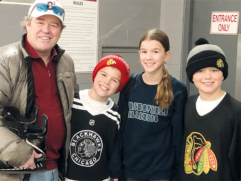 Matt Bergeron of Flossmoor came to the H-F Ice Arena during open skate with his children Price, Simone and Ryder. (Marilyn Thomas/H-F Chronicle)