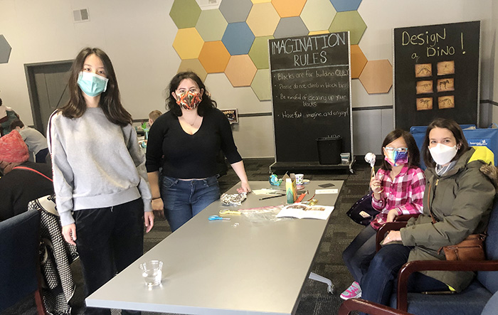 From left, Yue Pan and Louise Gagnon with Avery Cheung and her mother, Karen Cheung, at the recent Homewood Science Center STEM Saturday event. (Nick Ulanowski/H-F Chronicle)