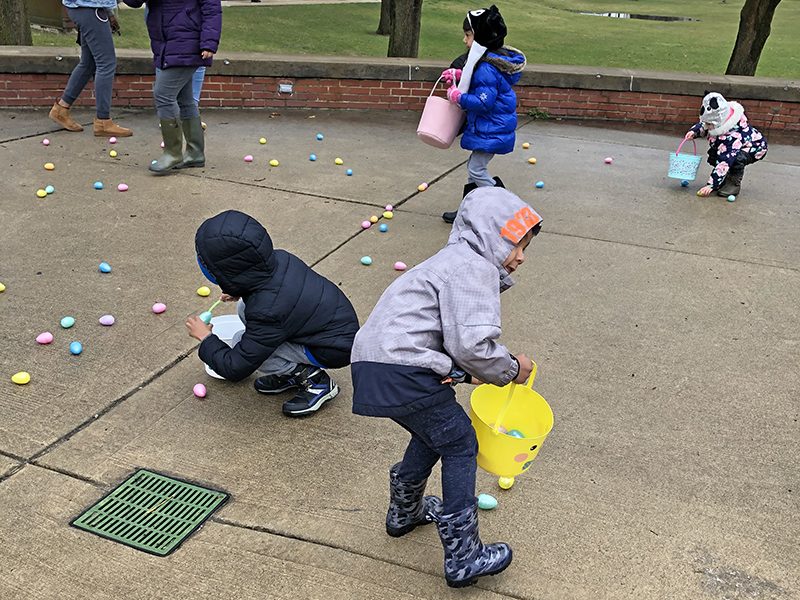 The grass at Irwin Park was off limits due to the weather, so kids collected eggs from around the gazebo and play equipment at the park. (Marilyn Thomas/H-F Chronicle)